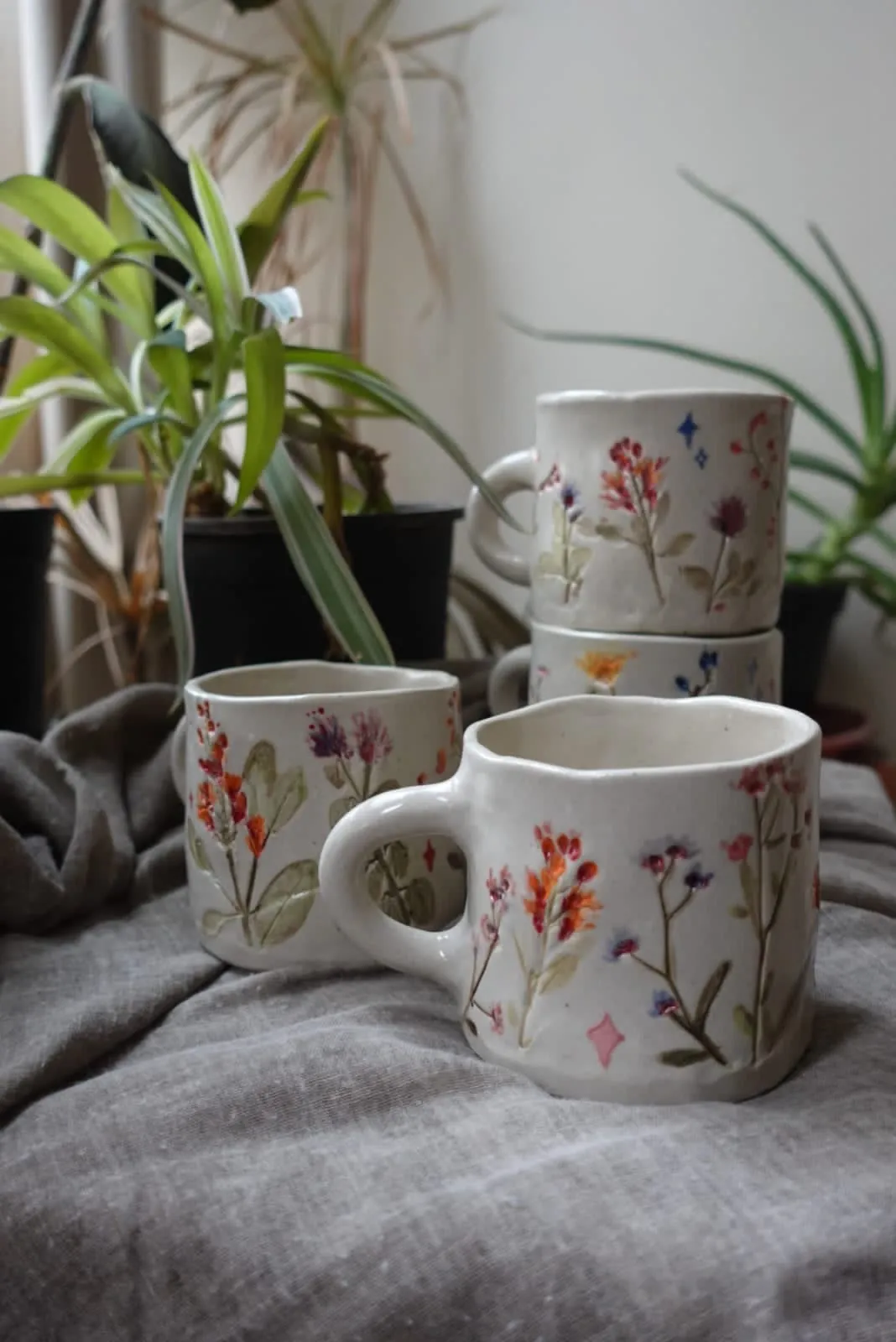Mugs pressed with real wildflowers and painted petal by petal